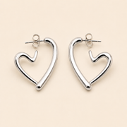 Aretes Amara Plateados Hadorelle en acero inoxidable