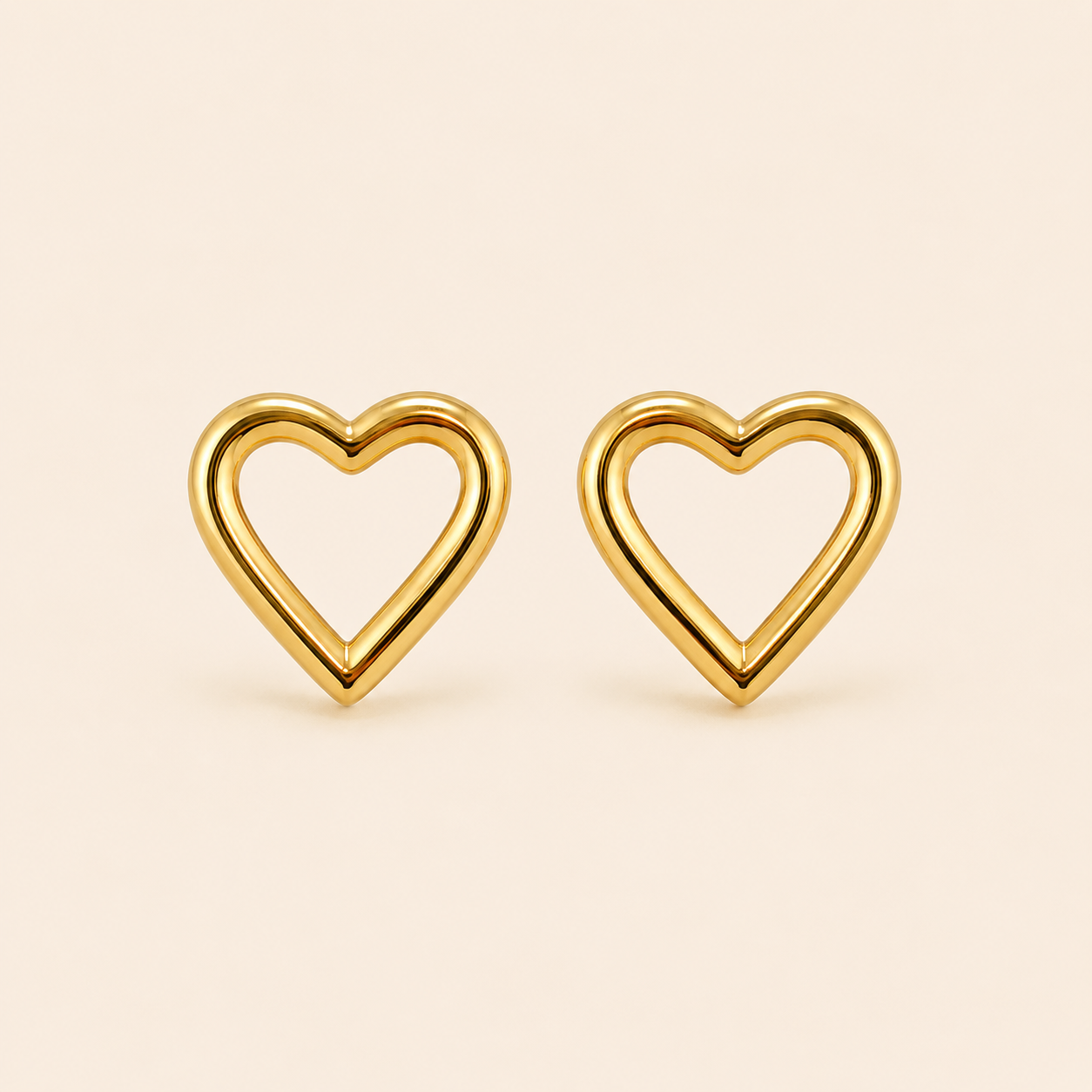 Aretes Corazón Maelle Dorados Hadorelle en acero inoxidable