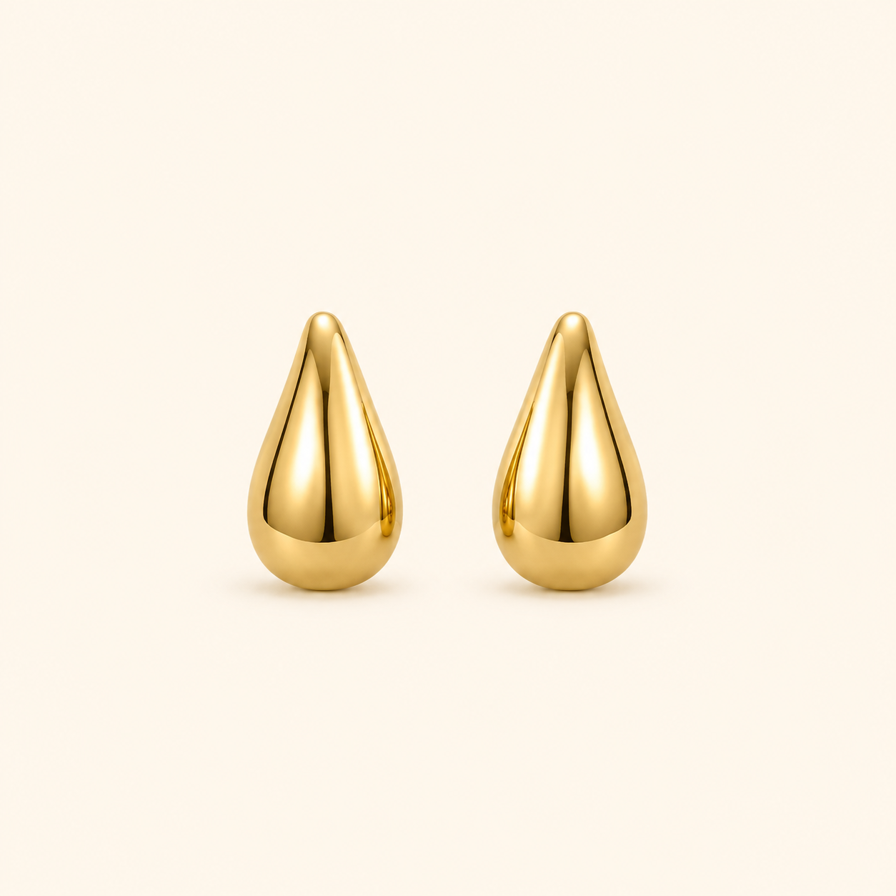 Aretes Gota Luma Dorados Hadorelle en acero inoxidable