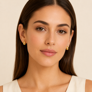 Aretes Gota Luma Dorados Hadorelle modelado