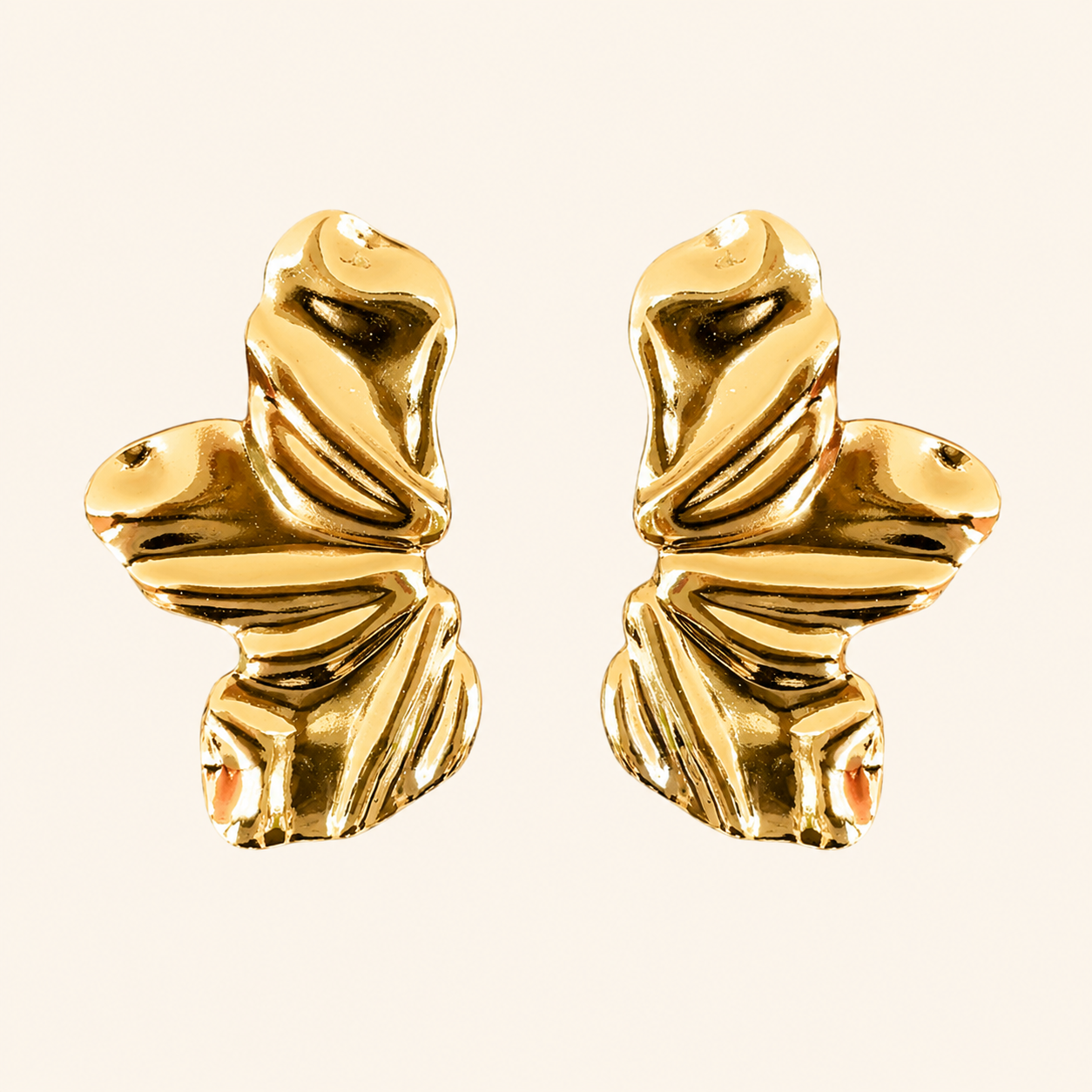 Aretes Solé Hoja Dorada Hadorelle en acero inoxidable