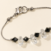 Pulsera Nerisse Cristales Negro y Transparente Plata .925